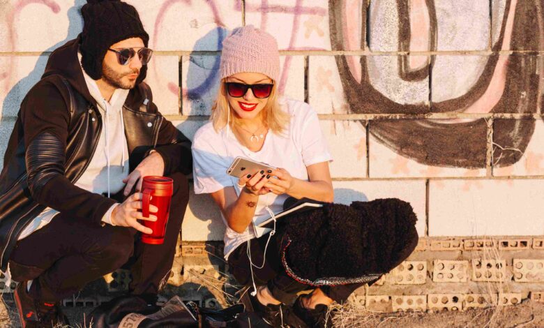 Couple near brick wall