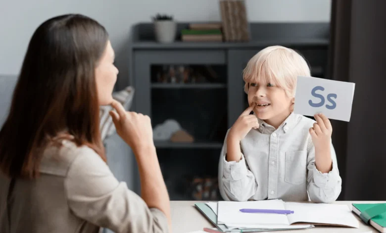 white haired young boy getting adhd treatment from female expert